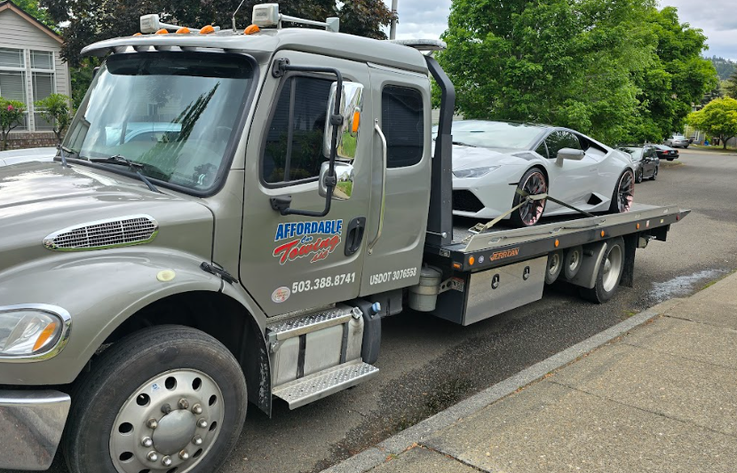 Tow truck providing car towing service in Sandy Oregon near Highway 26